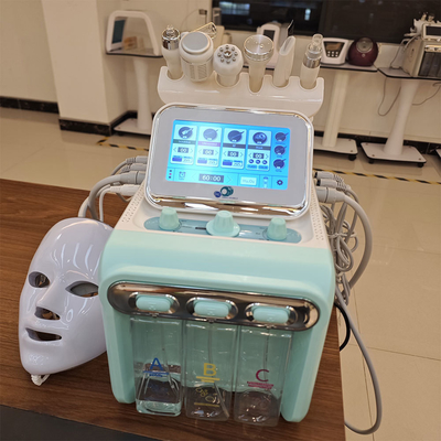 Máquina facial de chorro de oxígeno portátil Peeling y dermoabrasión de chorro de agua para una piel joven