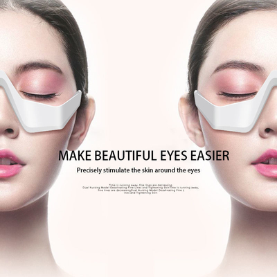 Dispositivo de terapia de luz roja MANUAL para ojeras y masajeador de ojos de micro-corriente Ems