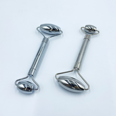 Rollo de masaje facial de atención médica Oro de acero inoxidable Gua Sha Set para el cuello y la cara